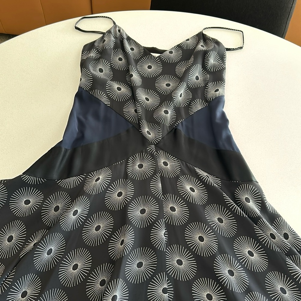 Cocktail dress with handkerchief hemline